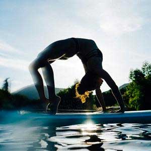 Doing Yoga on a Rigid Inflatable Paddle Board